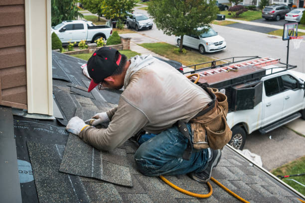 Professional Roofing technician working in Lake, MS